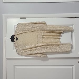 A.n.a woman's tan and white sweater